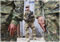 A U.S. soldier on guard during a transfer of private security forces to the Afghan Public Protection Force (front) near Kabul. President Hamid Karzai said NATO should speed up security transfers. <br>AHMAD JAMSHID / Associated Press